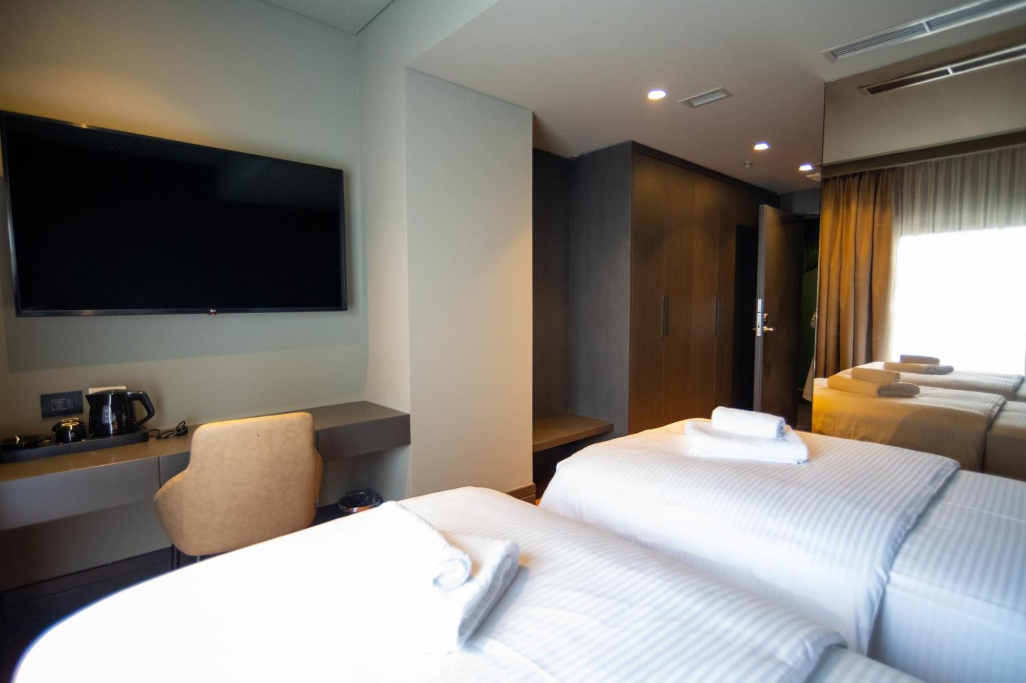 Arka Art Hotel Tirana Bagian luar foto Deluxe Room