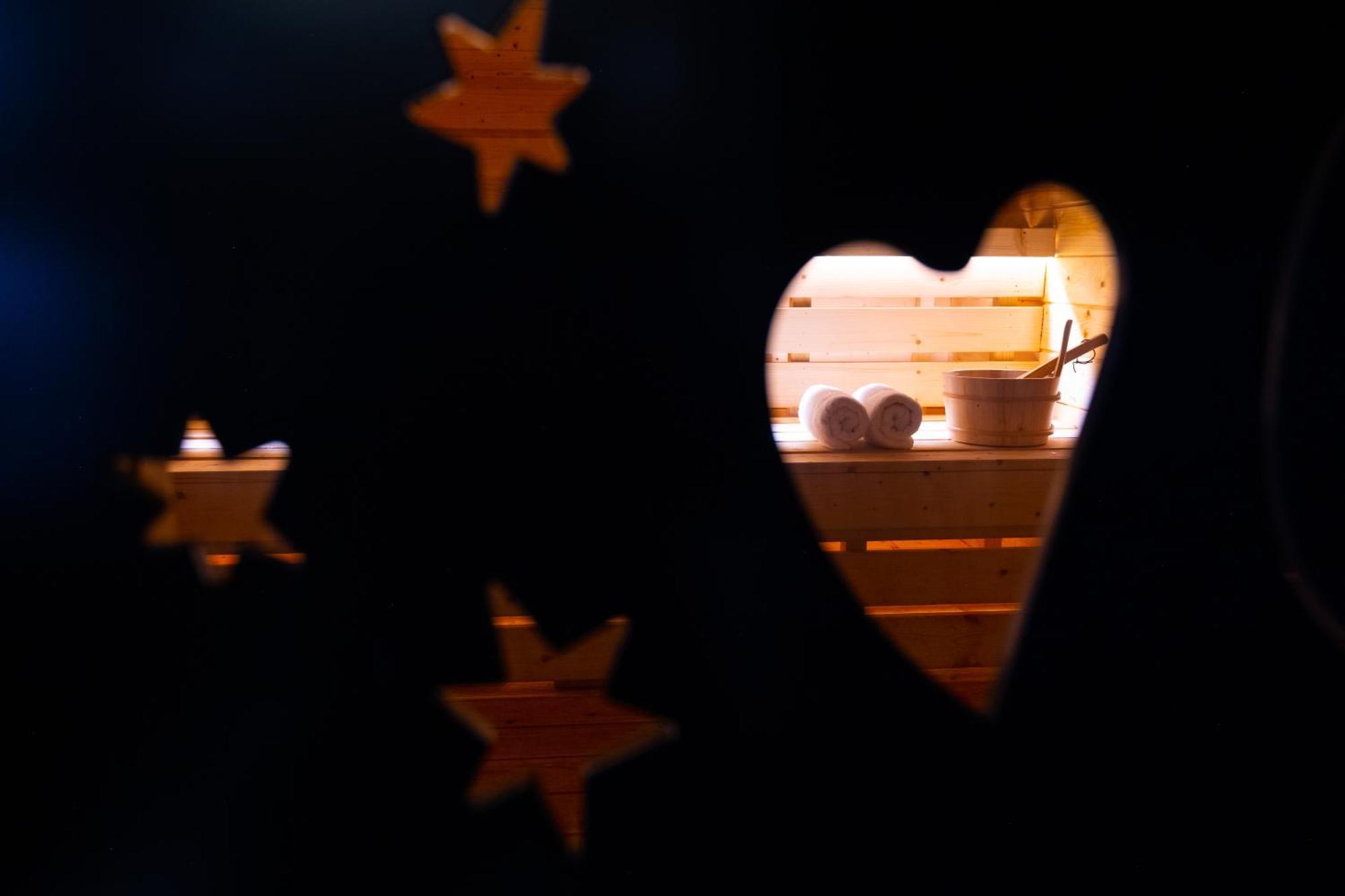 Arka Art Hotel Tirana Bagian luar foto A heart-shaped window